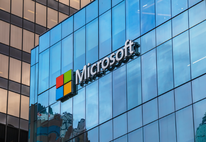 Microsoft Hiring Freshers 2025: Cloud Network Engineer Internship Opportunity 1 Microsoft logo on modern glass building